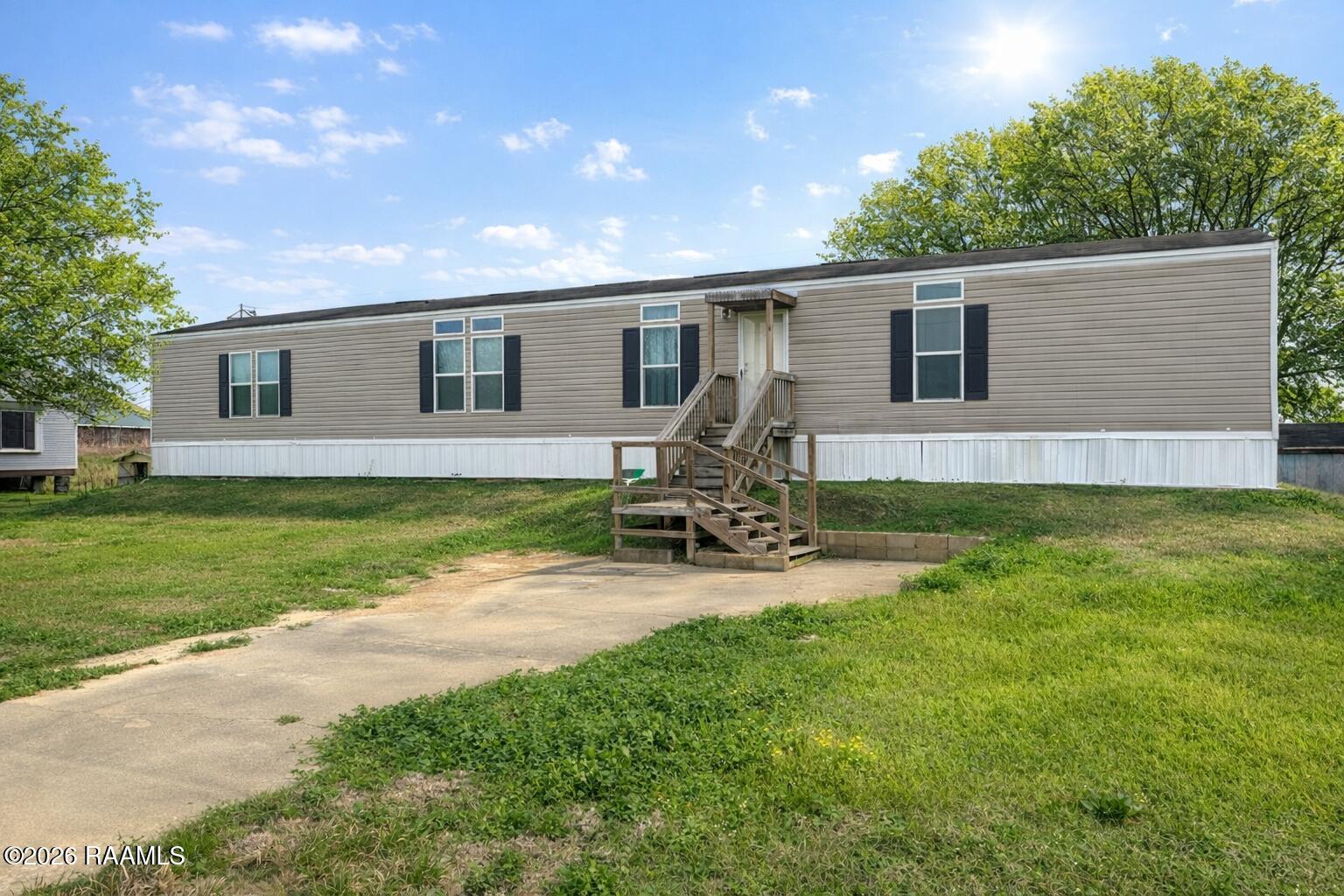 102 Dassas Street Scott, LA 70583 - Photo 1 of 12 36BD2B85-AAEB-4396-B4C7-0E3E887D5B10