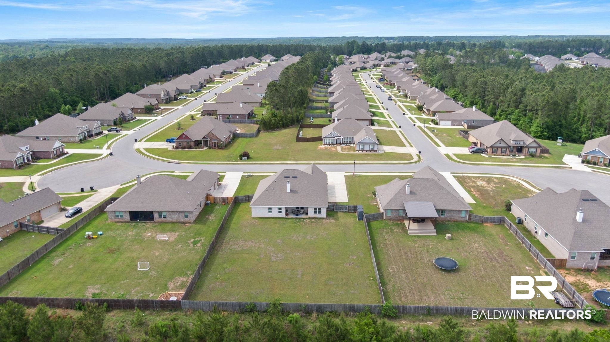 31187 Spoonbill Road Daphne, AL 36527 - Photo 71 of 85 Aerial perspective showcasing a residential community with uniform architectural styles