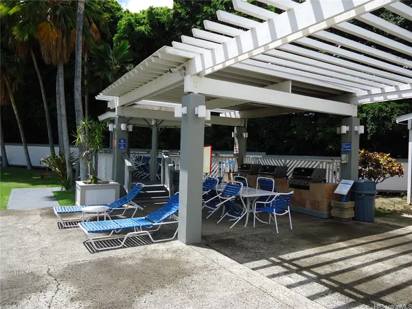 a view of a backyard with a sitting area