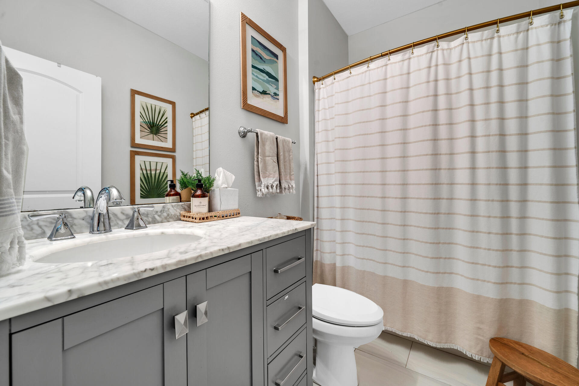 59 Woodland Drive Santa Rosa Beach, FL 32459 - Photo 29 of 42 a bathroom with a granite countertop toilet sink and mirror