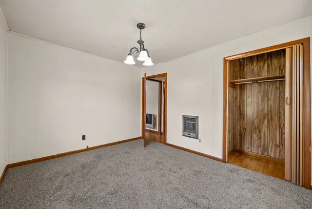 a view of a livingroom with a chandelier