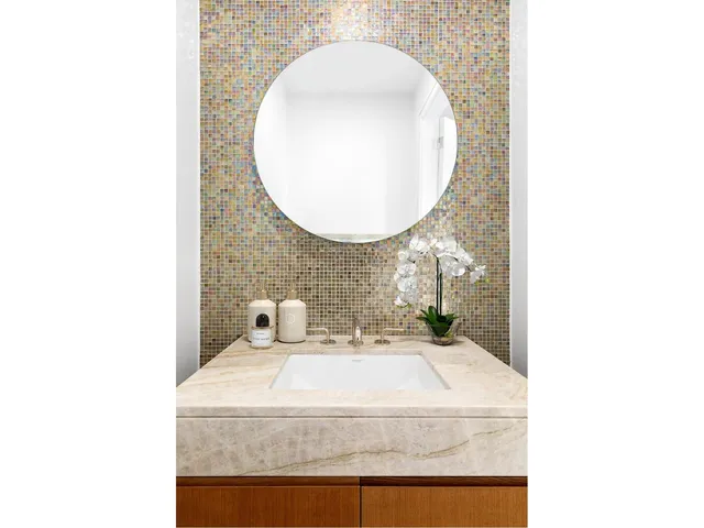 a roof deck with a table and chairs