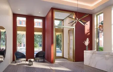 a view of brick building with potted plants