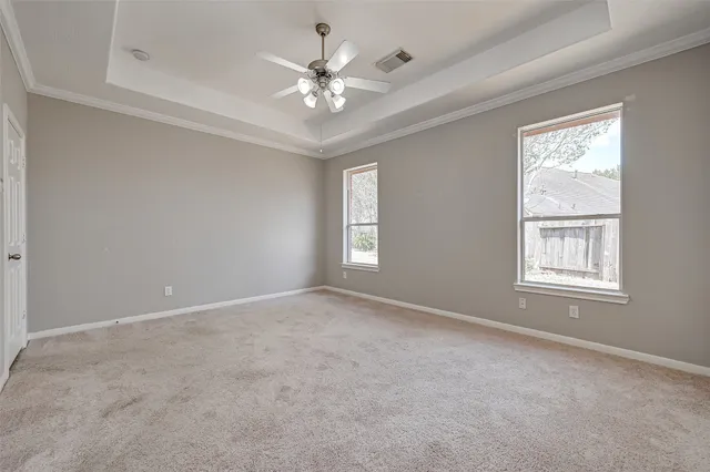 a bathroom with a sink double vanity and a mirror