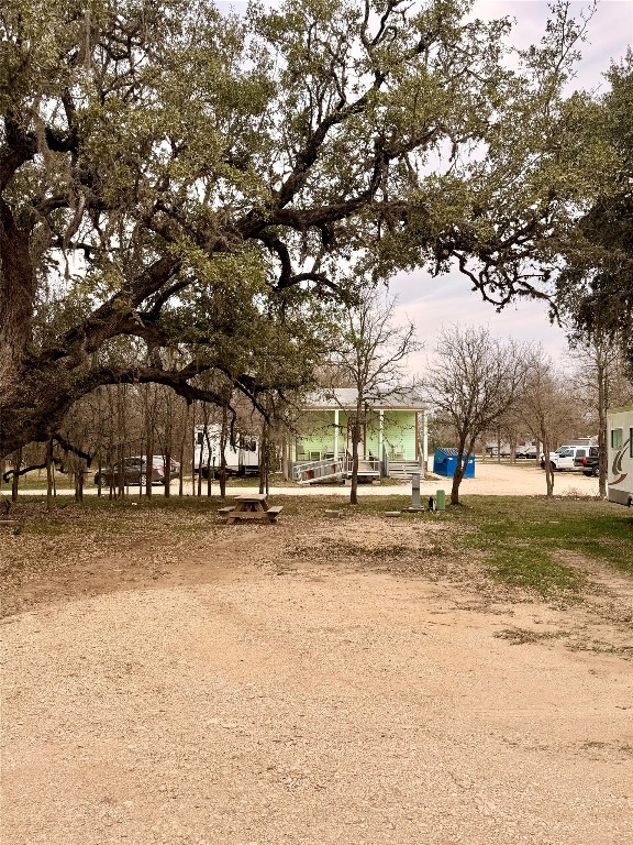 270 Hidden Path Lockhart, TX 78644 - Photo 8 of 27 a view of a yard with a tree