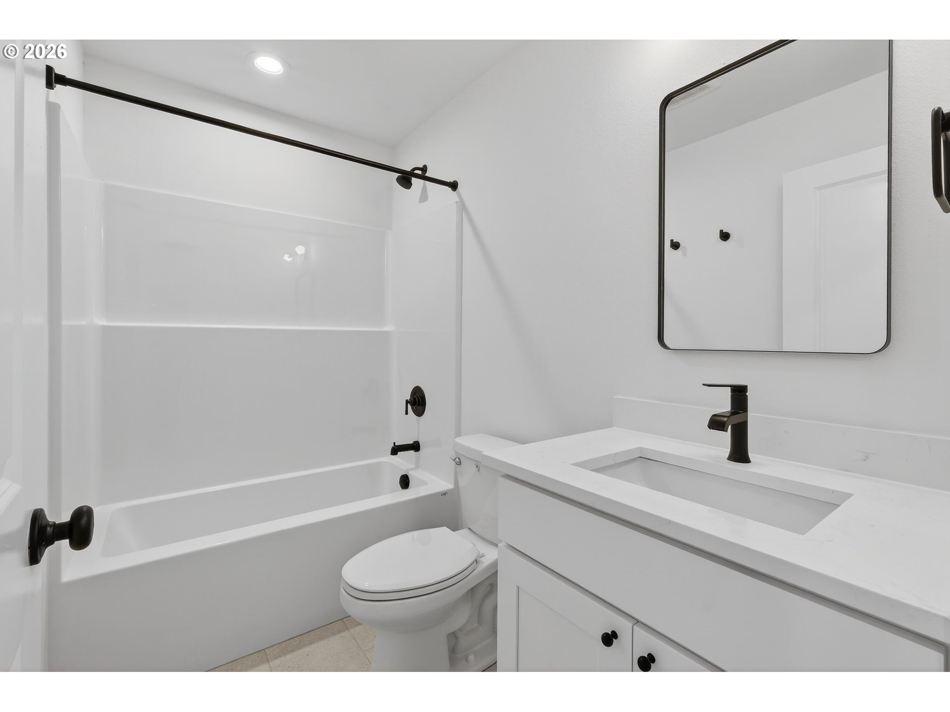 4059 Southwest McKinley Street, Unit 40 Gresham, OR 97080 - Photo 24 of 39 a bathroom with a sink a toilet and a mirror