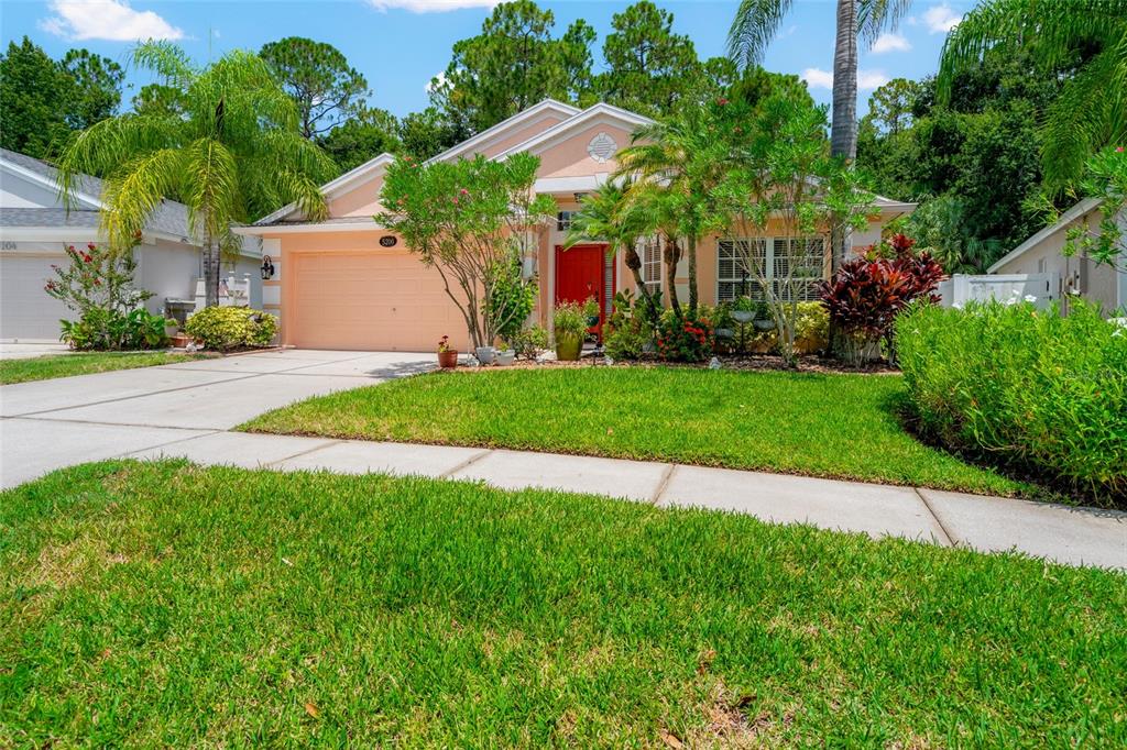 5200 Culpepper Place Wesley Chapel, FL 33544 - Photo 1 of 1 a front view of house with yard and green space