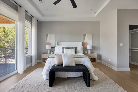 a bed room with a bed and a lamp