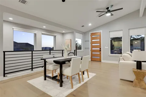 a living room with furniture and a table