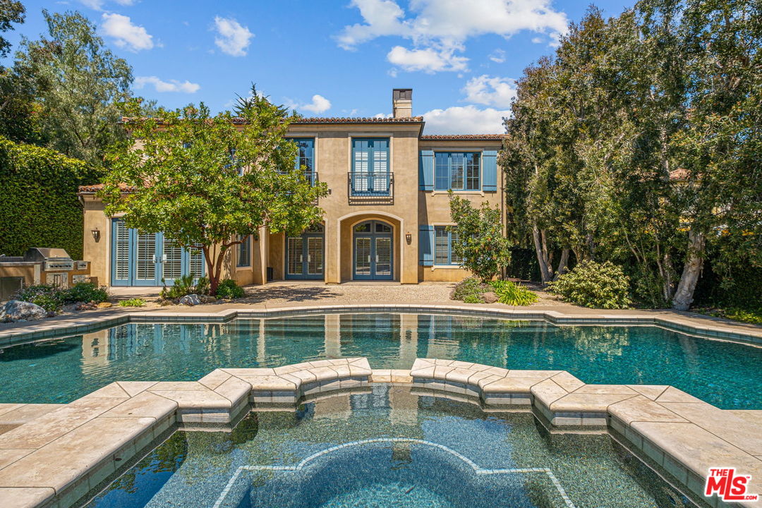 702 Patterson Place Pacific Palisades, CA 90272 - Photo 2 of 18 a view of a house with a yard