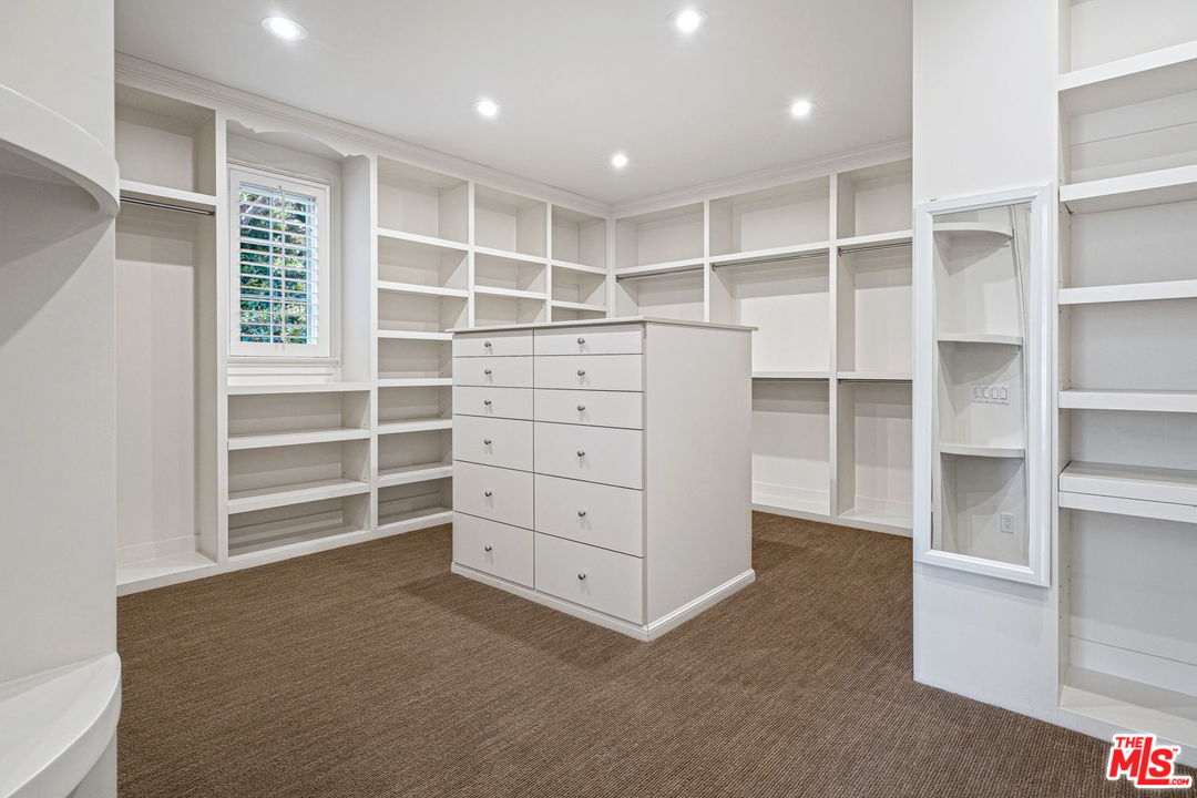 702 Patterson Place Pacific Palisades, CA 90272 - Photo 15 of 18 a view of an empty walk in closet