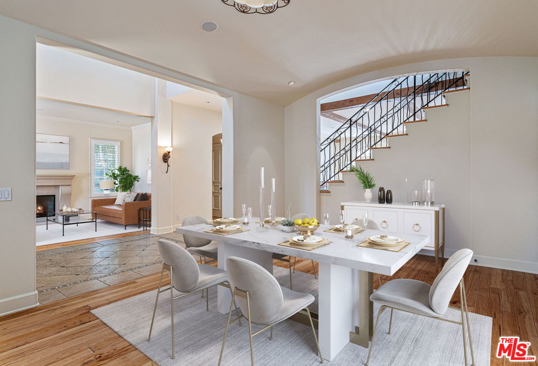 702 Patterson Place Pacific Palisades, CA 90272 - Photo 6 of 18 a dining room with furniture and wooden floor