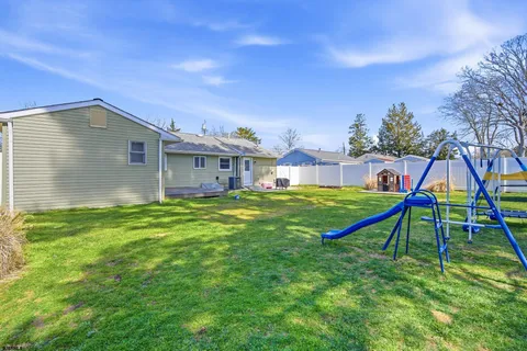 a house view with a backyard