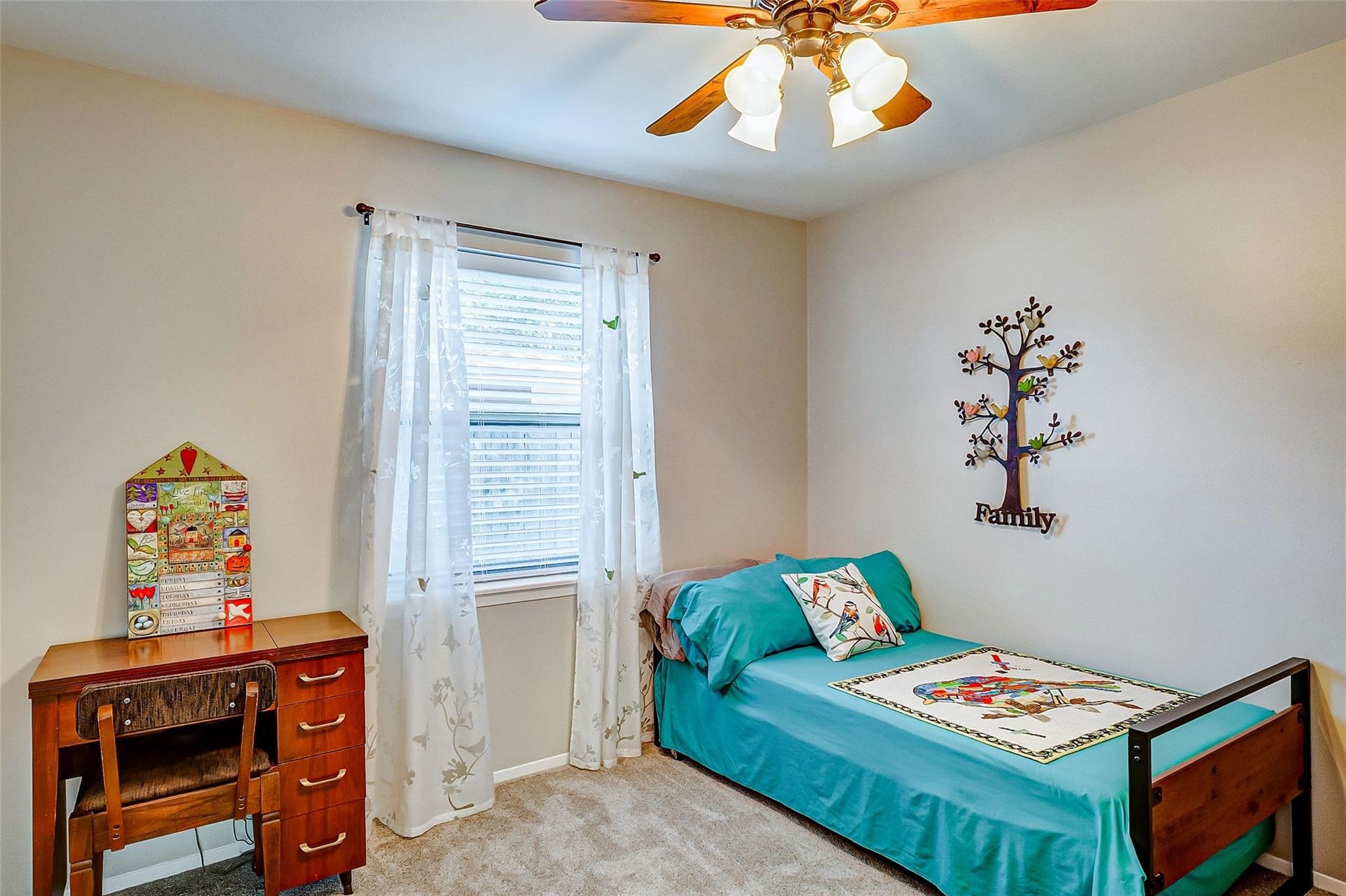 9218 Hammerly Boulevard Houston, TX 77080 - Photo 17 of 40 a living room with furniture and a window