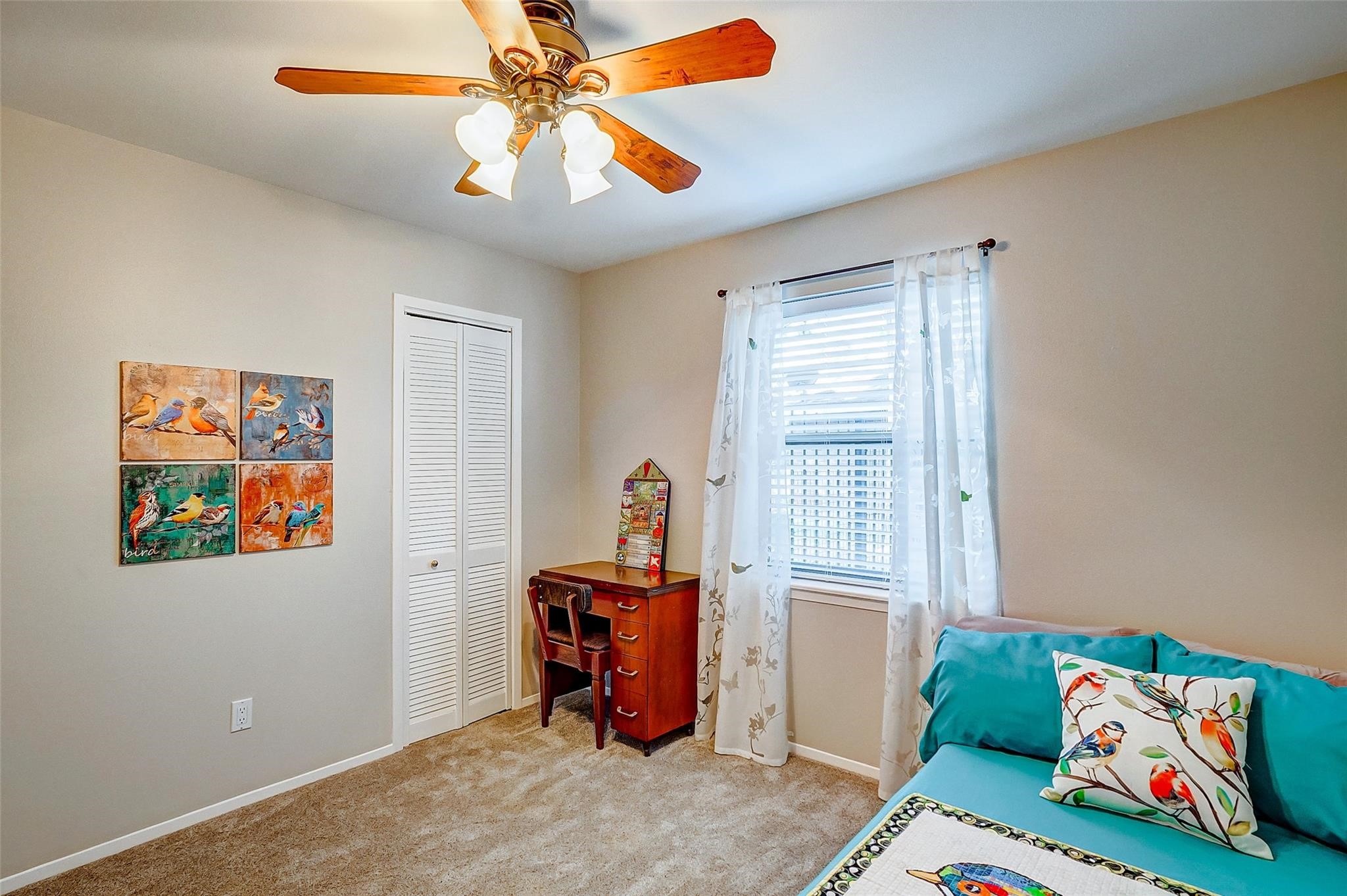 9218 Hammerly Boulevard Houston, TX 77080 - Photo 19 of 40 a bedroom with furniture and a window