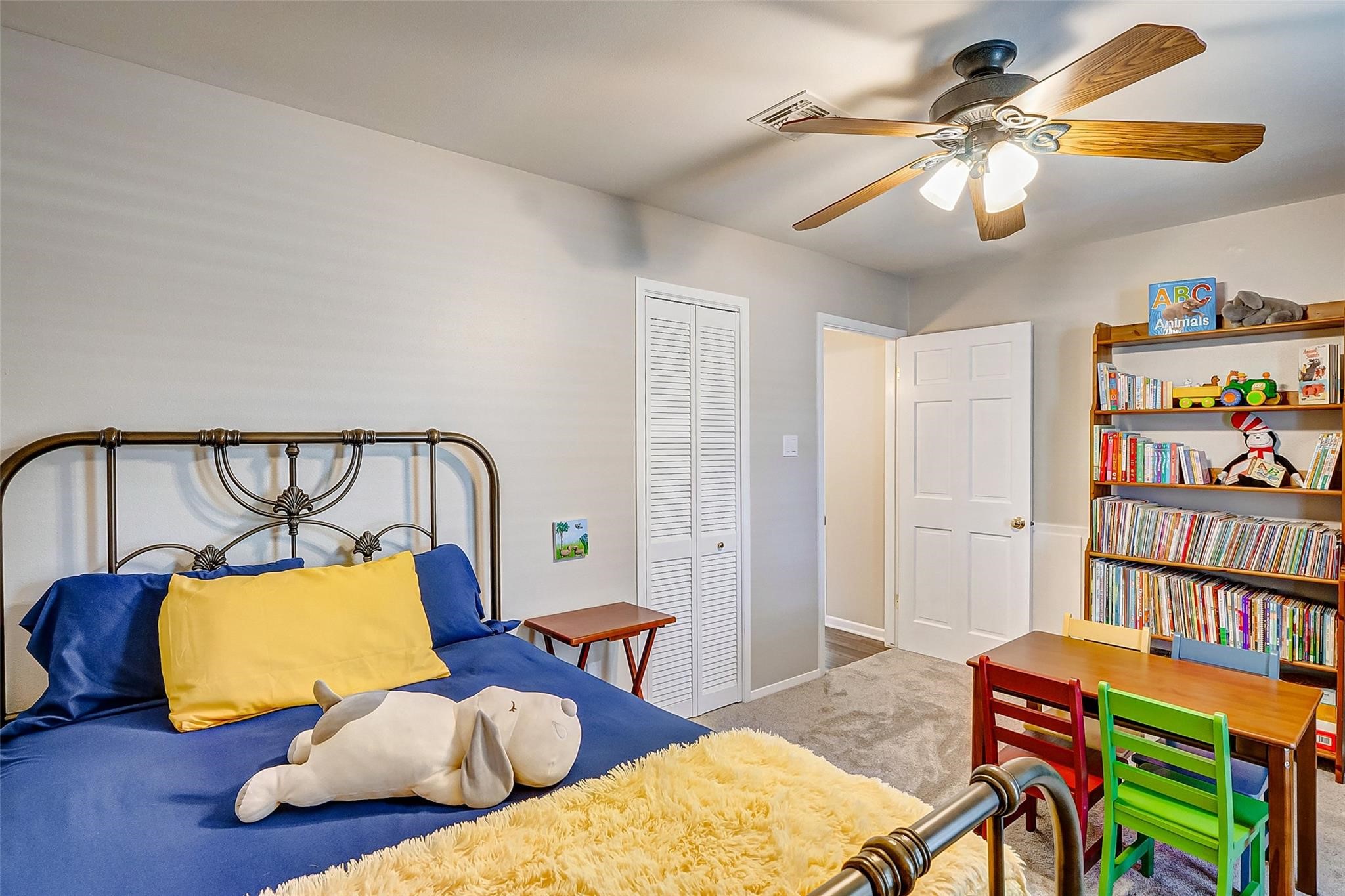 9218 Hammerly Boulevard Houston, TX 77080 - Photo 21 of 40 a bedroom with furniture and a rug