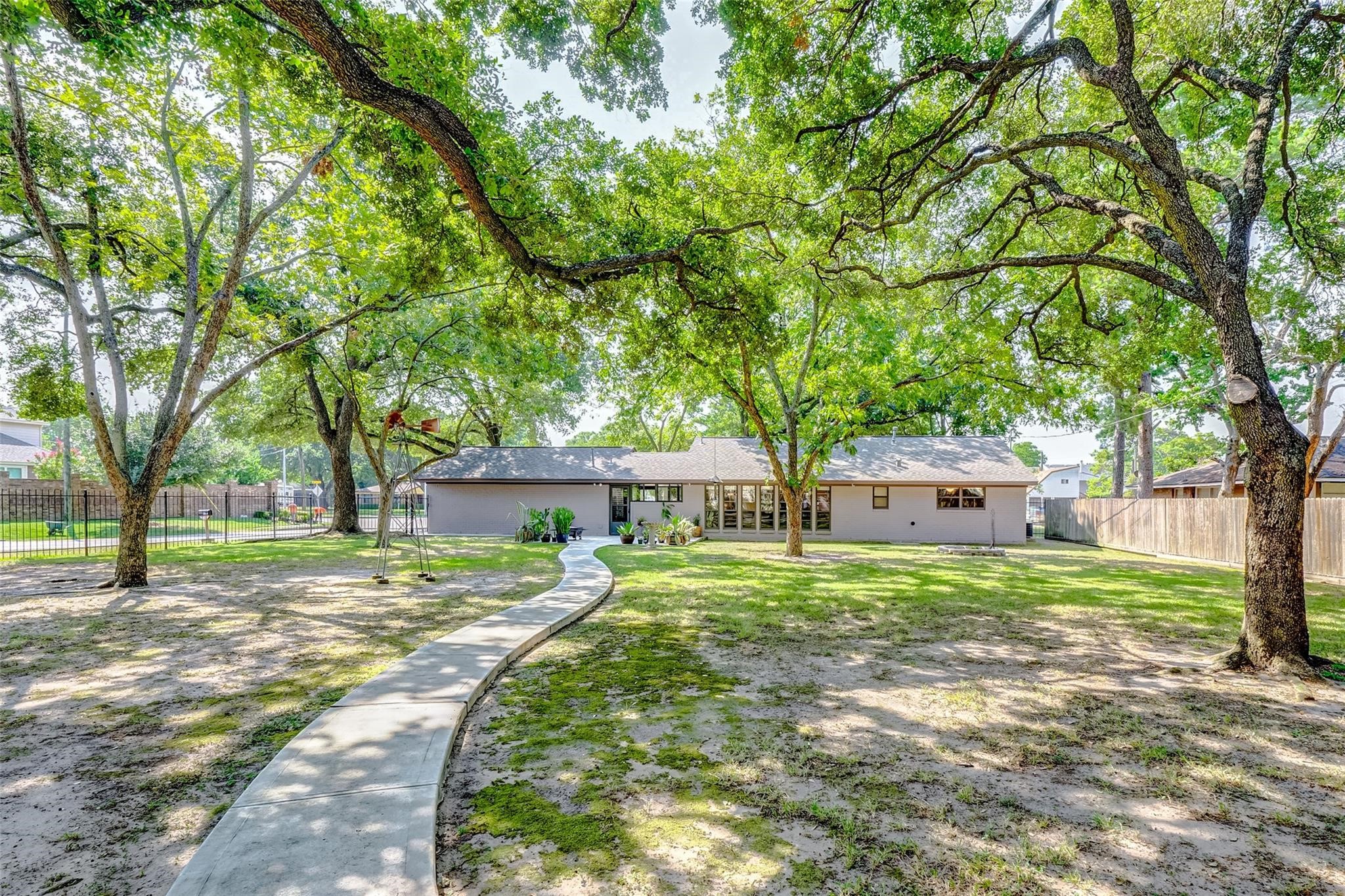 9218 Hammerly Boulevard Houston, TX 77080 - Photo 37 of 40 a house with a tree in front of it