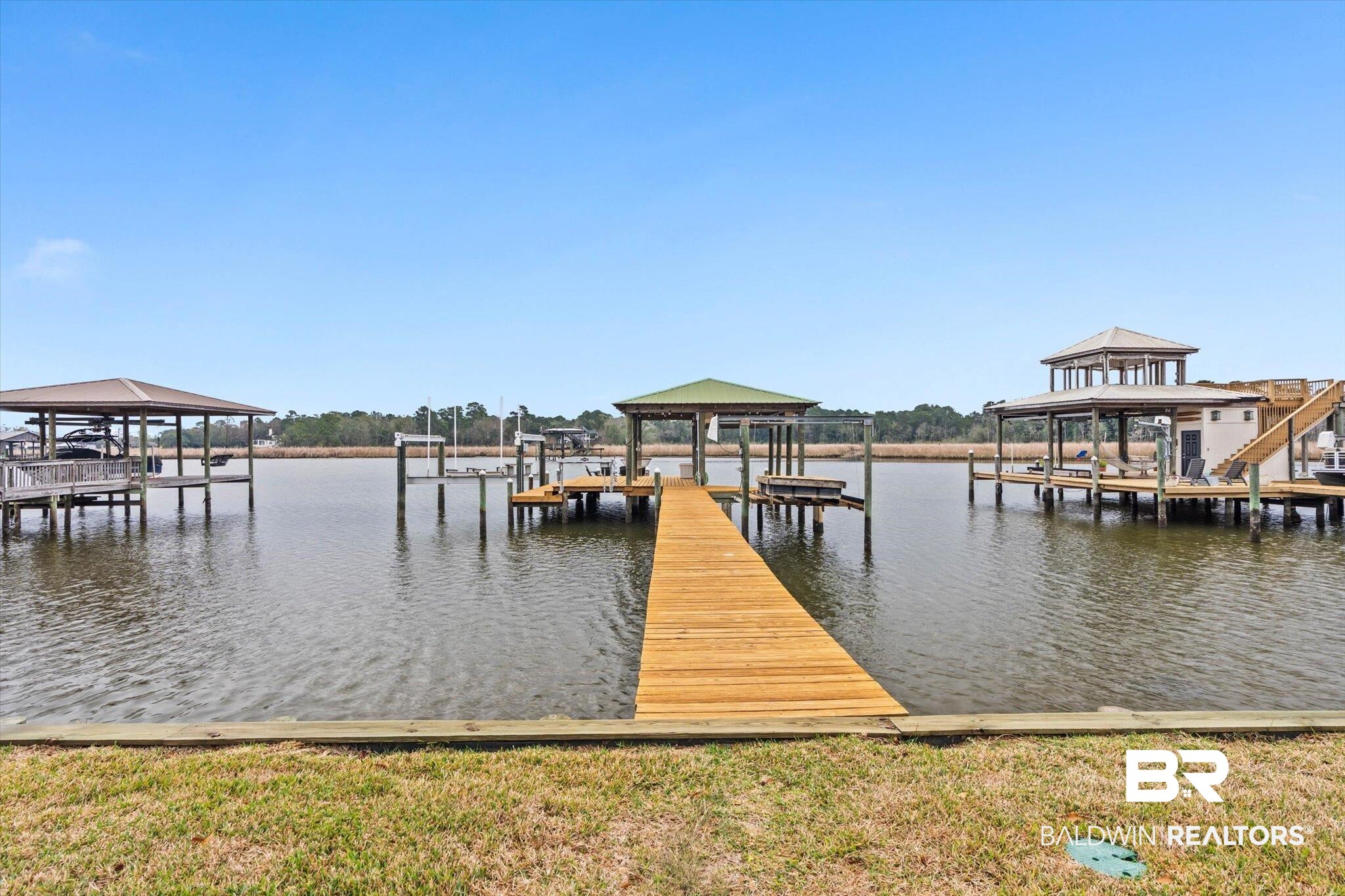 4851 Audubon Drive Mobile, AL 36619 - Photo 27 of 46 Dock with boat lift and a water view