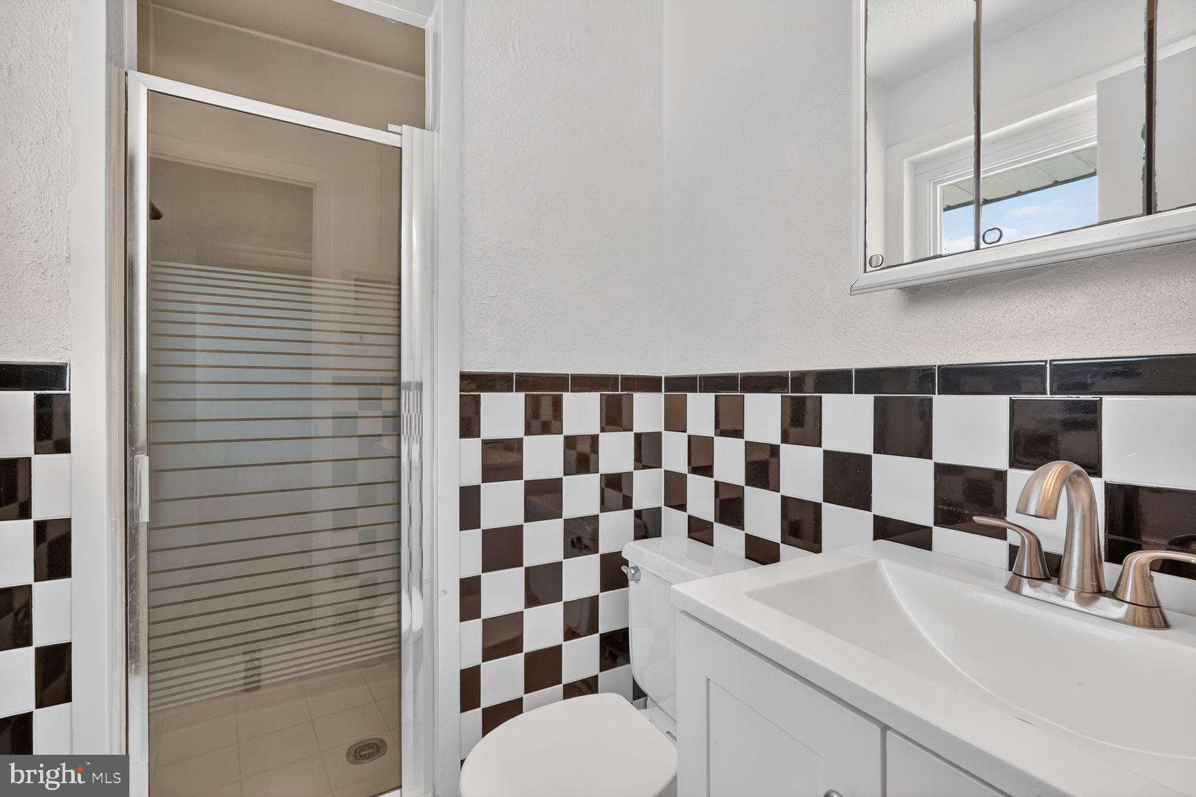 4202 Yates Road Beltsville, MD 20705 - Photo 18 of 31 Chic bathroom with modern accents.