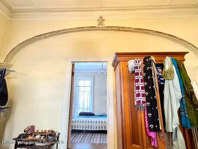 a view of a room with rack and shoes