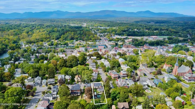 a view of a city with mountain