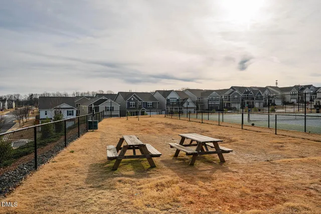 a view of a terrace with chairs
