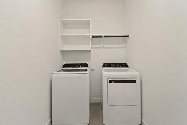 a bathroom with a sink double vanity and a mirror