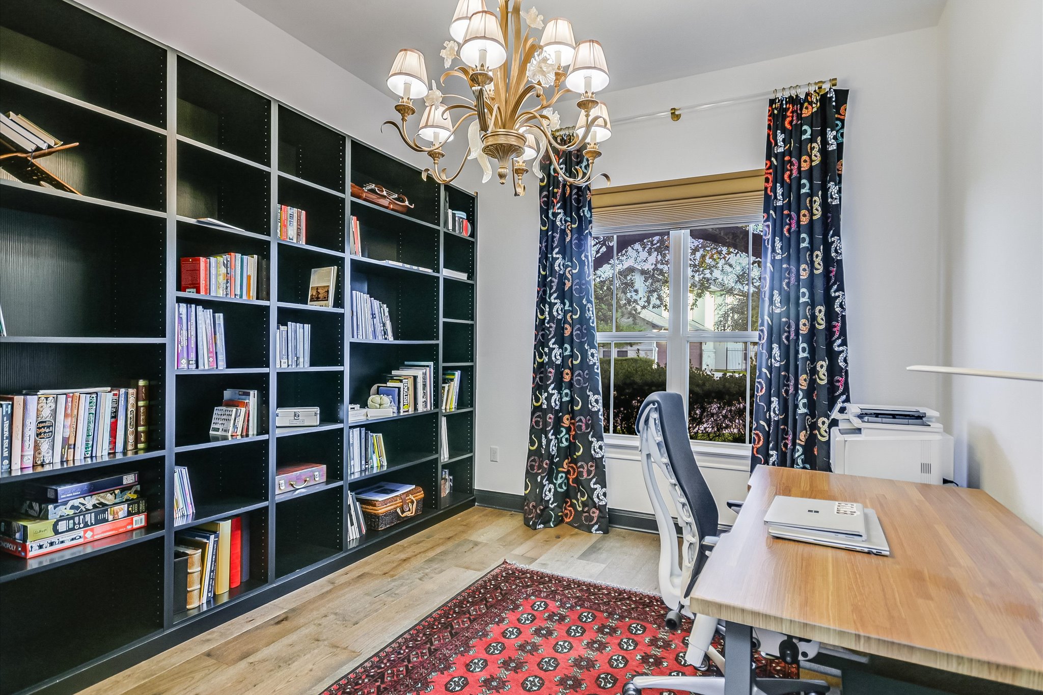 2625 Arion Circle Austin, TX 78730 - Photo 18 of 32 Home office with wood finished floors and a chandelier