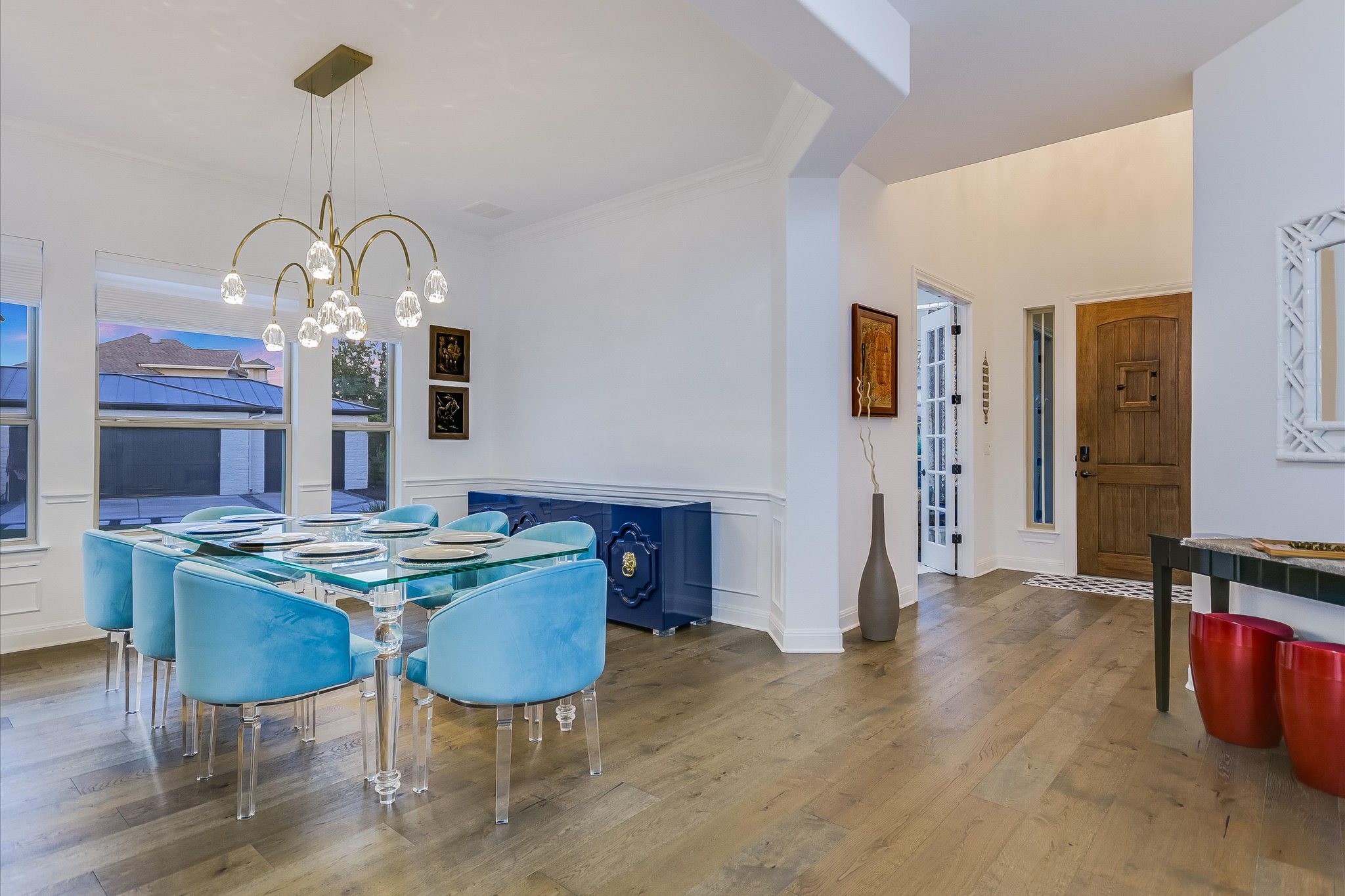 2625 Arion Circle Austin, TX 78730 - Photo 20 of 32 Dining space with wood finished floors, a chandelier, and ornamental molding