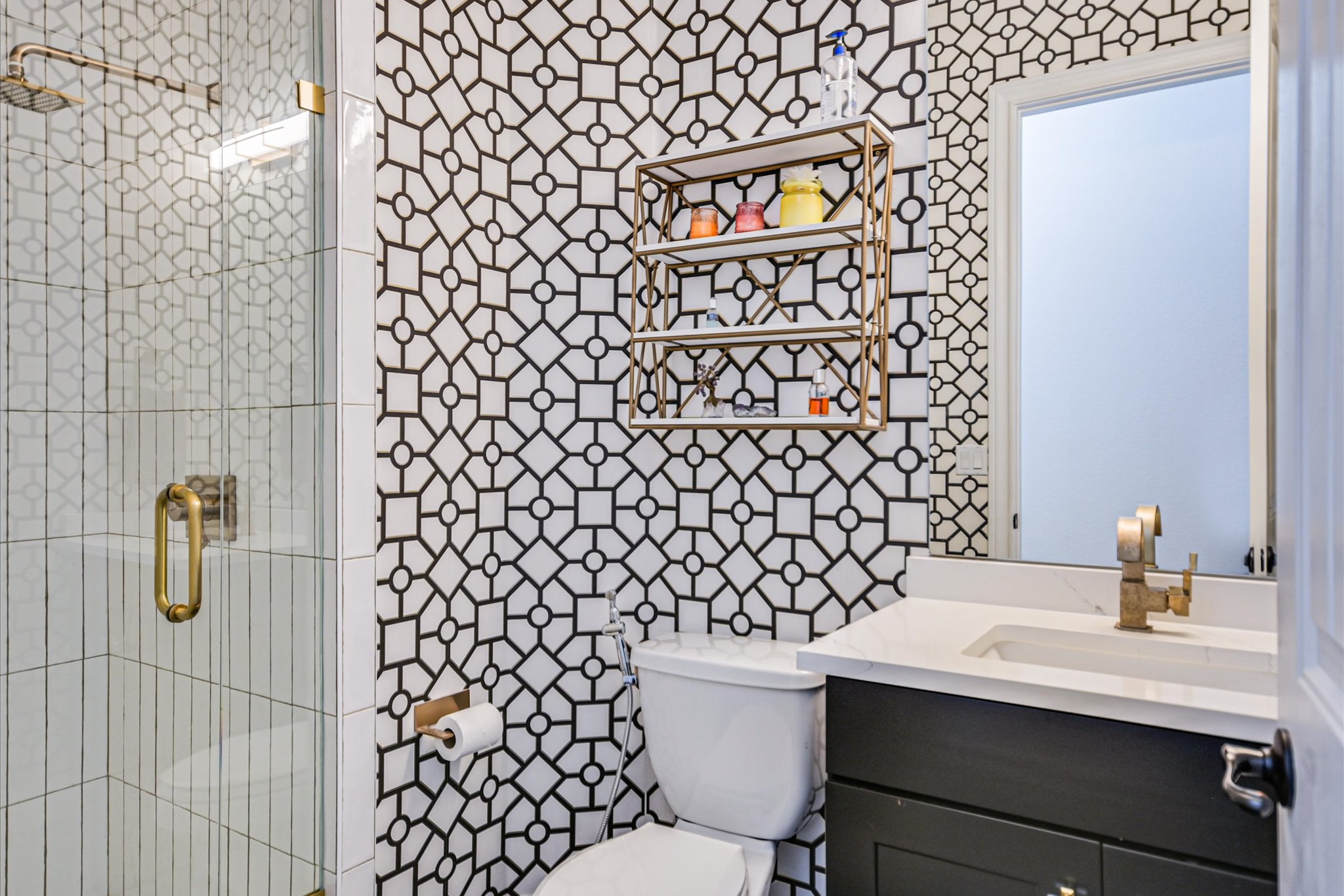 2625 Arion Circle Austin, TX 78730 - Photo 28 of 32 Bathroom with tile walls, vanity, and a stall shower