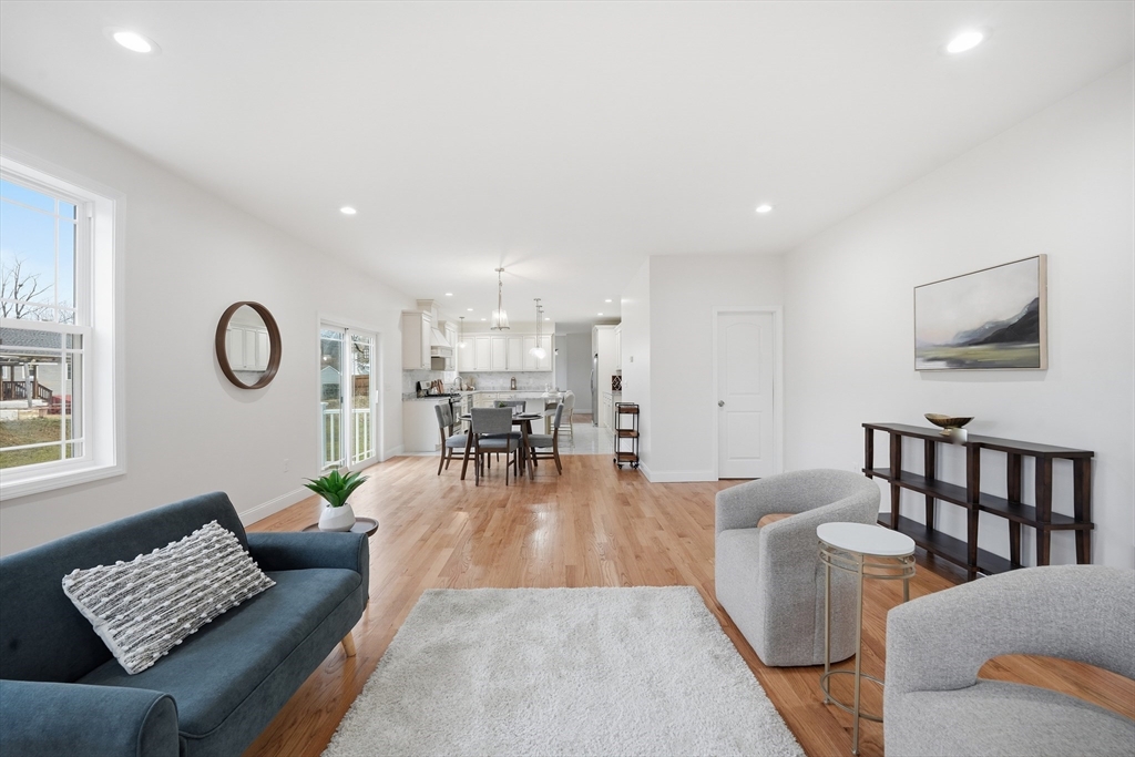 110 West Crystal Brook Drive Springfield, MA 01118 - Photo 11 of 40 a living room with furniture and a window