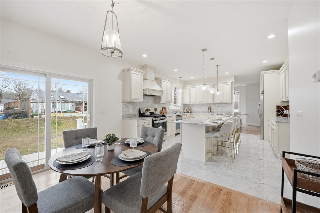 110 West Crystal Brook Drive Springfield, MA 01118 - Photo 13 of 40 a view of a dining room with furniture window and outside view
