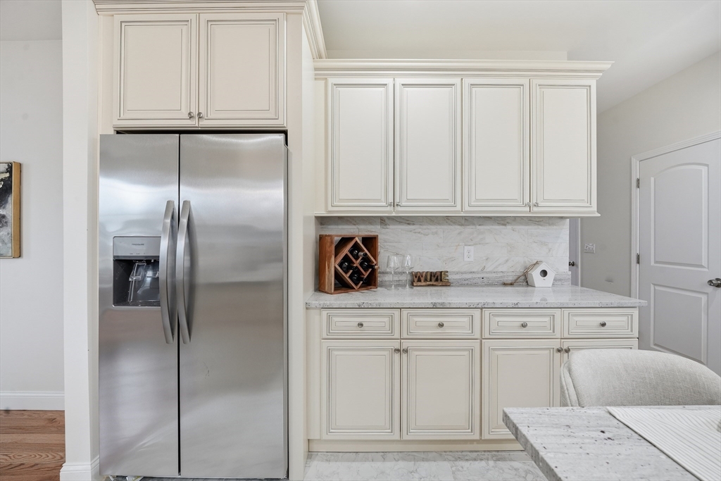 110 West Crystal Brook Drive Springfield, MA 01118 - Photo 19 of 40 a kitchen with white cabinets