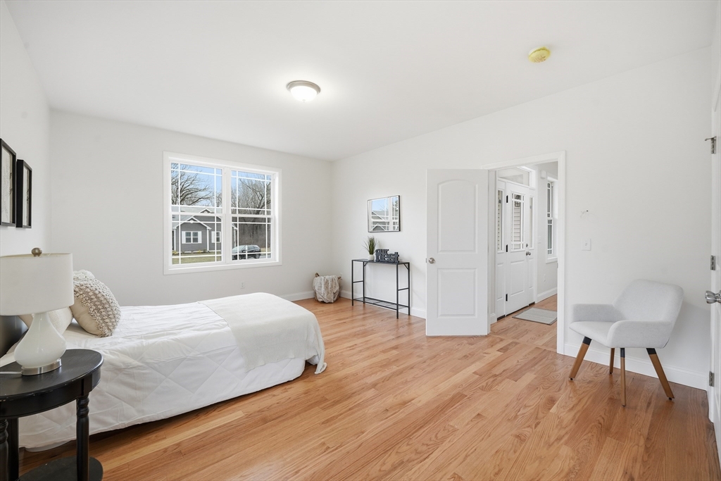 110 West Crystal Brook Drive Springfield, MA 01118 - Photo 24 of 40 a bedroom with a bed and a table
