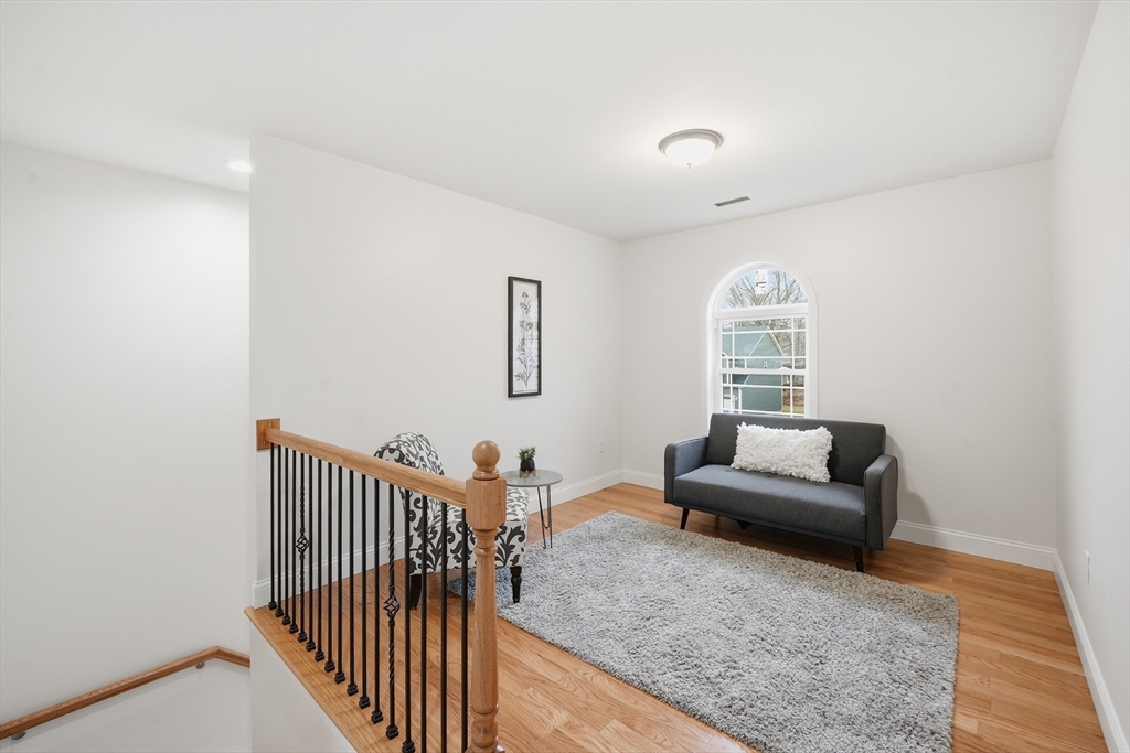 110 West Crystal Brook Drive Springfield, MA 01118 - Photo 26 of 40 a living room with furniture and a window