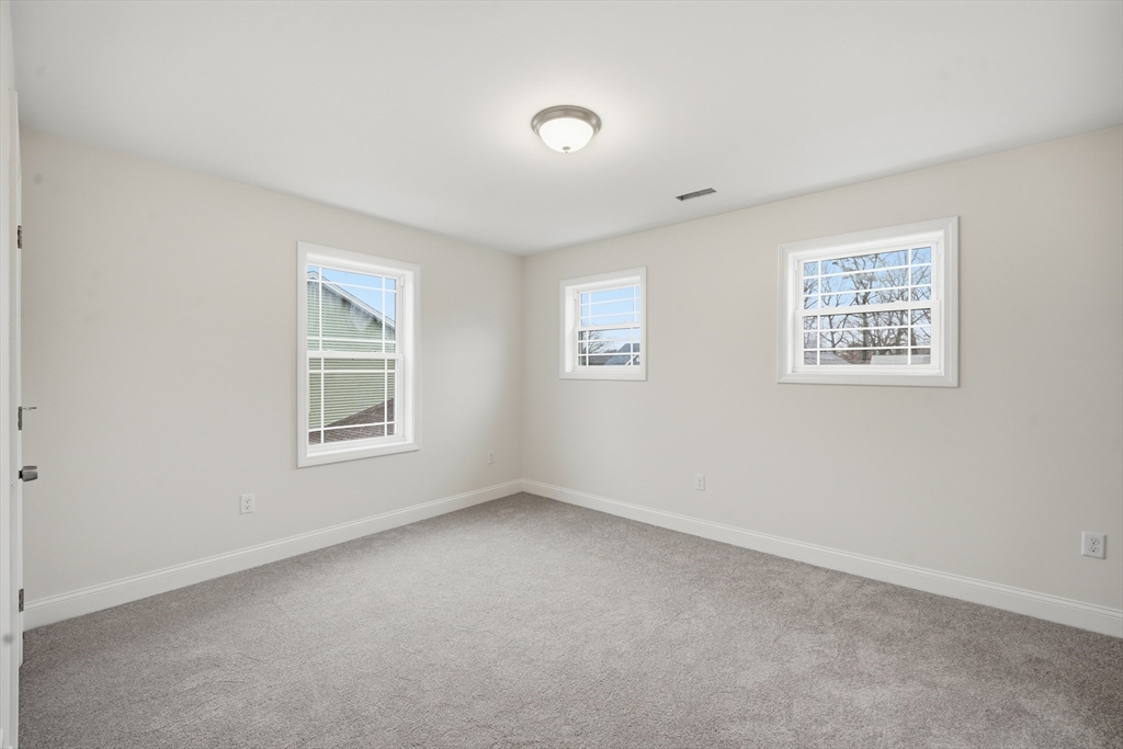 110 West Crystal Brook Drive Springfield, MA 01118 - Photo 29 of 40 an empty room with windows