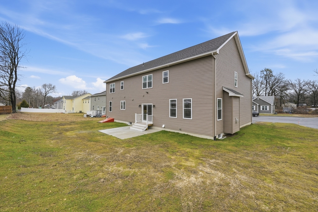 110 West Crystal Brook Drive Springfield, MA 01118 - Photo 3 of 40 a view of a house with backyard