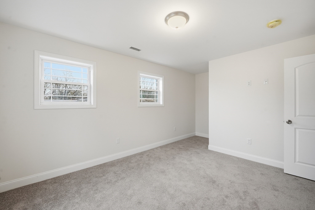110 West Crystal Brook Drive Springfield, MA 01118 - Photo 34 of 40 an empty room with windows