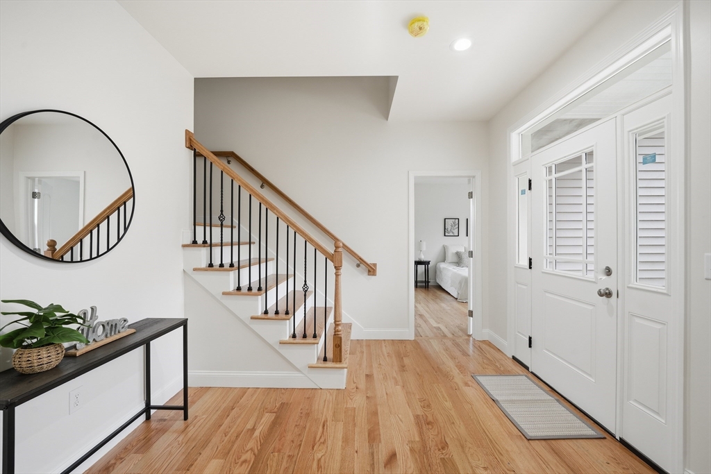 110 West Crystal Brook Drive Springfield, MA 01118 - Photo 7 of 40 a view of an entryway with wooden floor