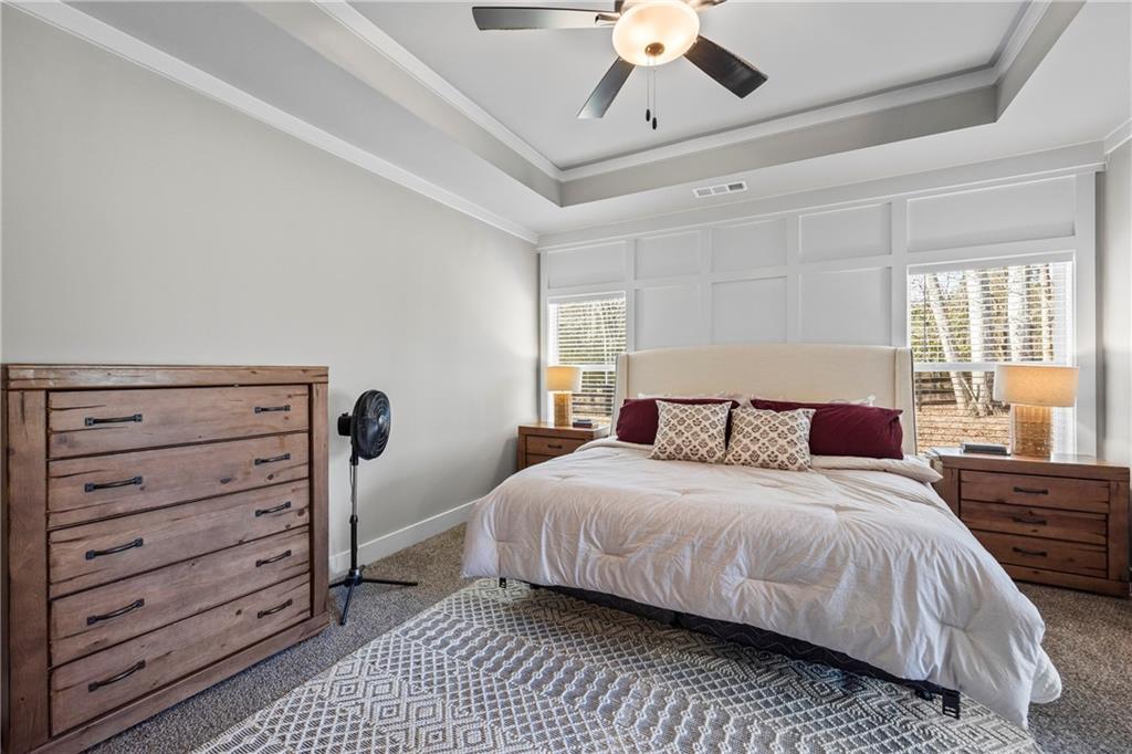 152 White Oak Way Monroe, GA 30655 - Photo 20 of 65 a bedroom with a bed and a dresser