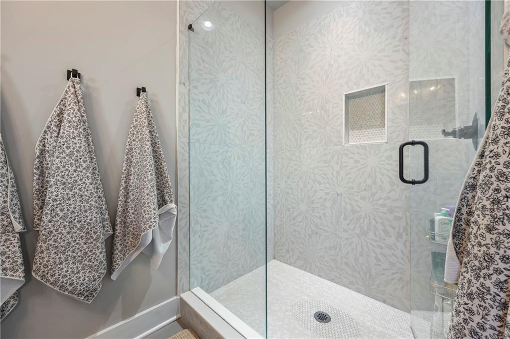 152 White Oak Way Monroe, GA 30655 - Photo 28 of 65 a bathroom with a shower
