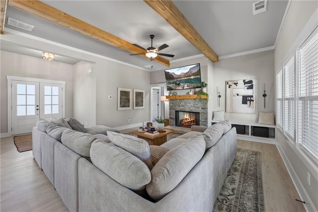 152 White Oak Way Monroe, GA 30655 - Photo 6 of 65 a living room with furniture fireplace and a window