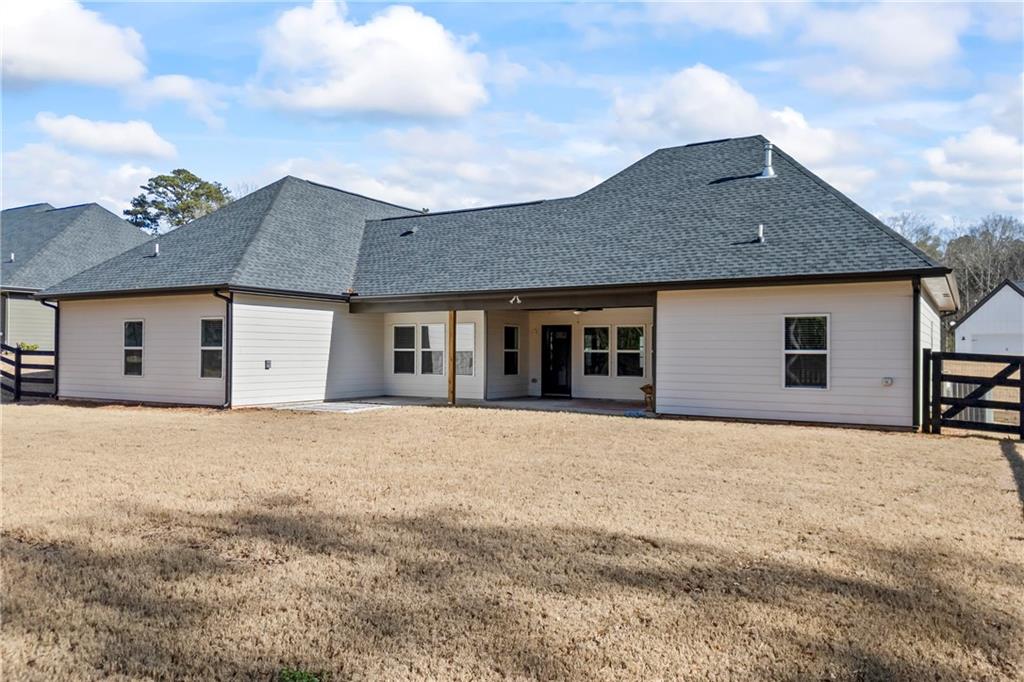 152 White Oak Way Monroe, GA 30655 - Photo 63 of 65 a front view of house with yard and trees
