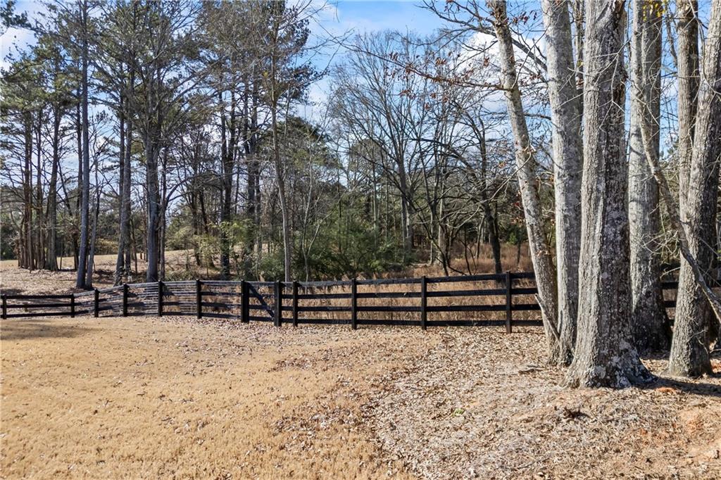 152 White Oak Way Monroe, GA 30655 - Photo 65 of 65 a view of outdoor space with deck and trees