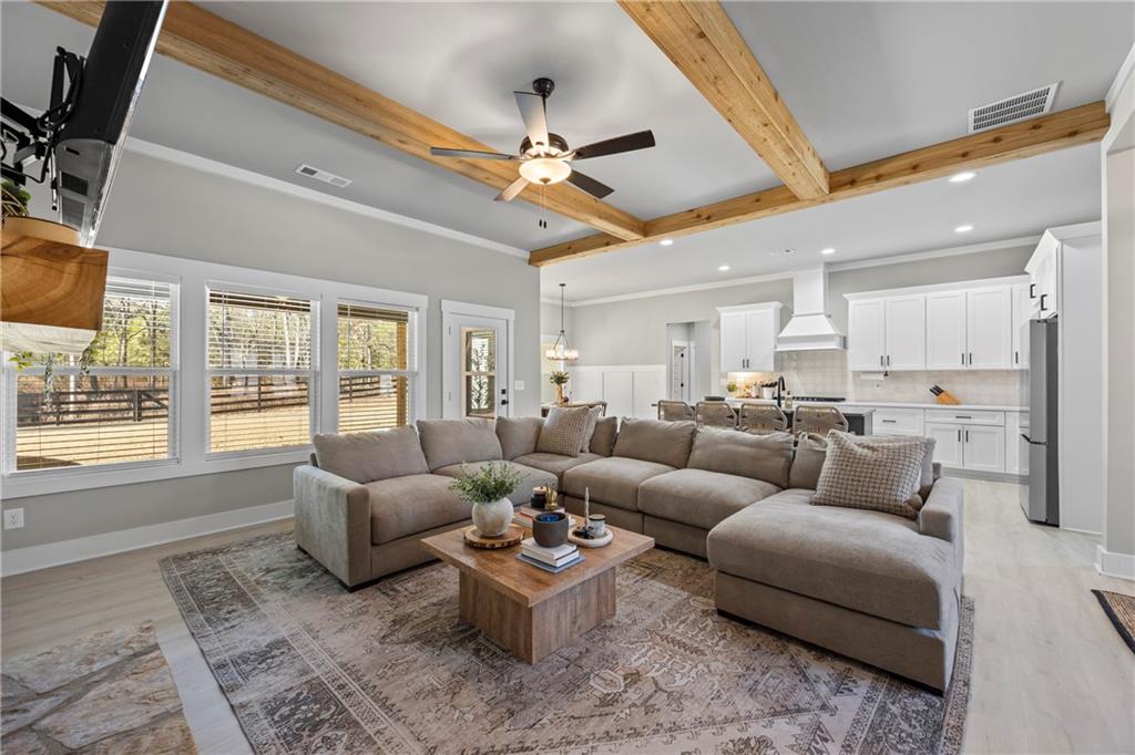 152 White Oak Way Monroe, GA 30655 - Photo 7 of 65 a living room with furniture and a large window