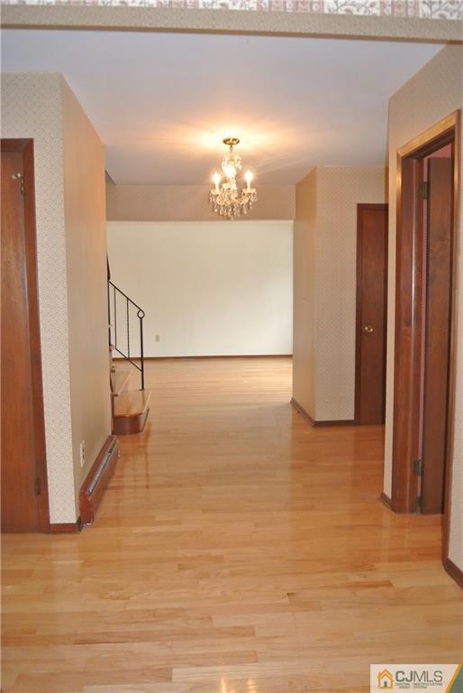 17 Woodruff Road Edison, NJ 08820 - Photo 11 of 25 a view of empty room with wooden floor