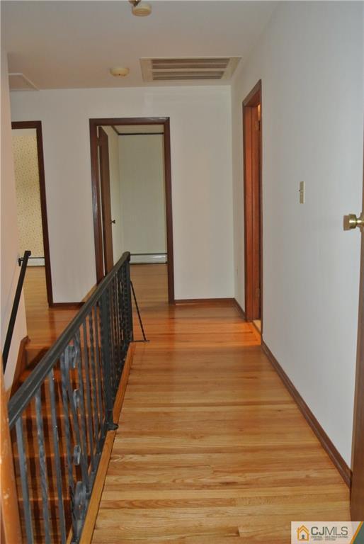 17 Woodruff Road Edison, NJ 08820 - Photo 15 of 25 a view of an entryway with wooden floor