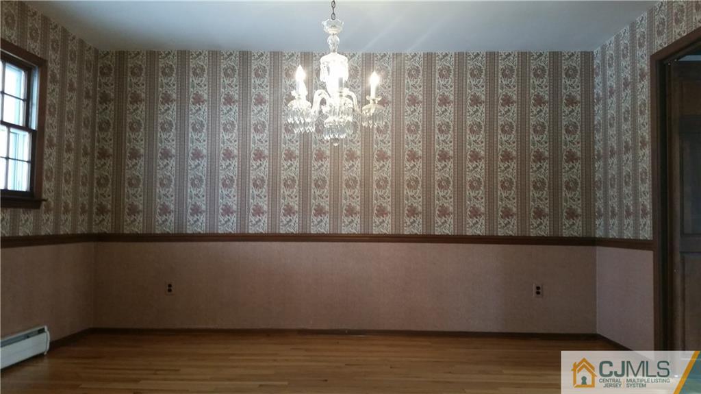 17 Woodruff Road Edison, NJ 08820 - Photo 10 of 25 a view of kitchen with furniture and wooden floor
