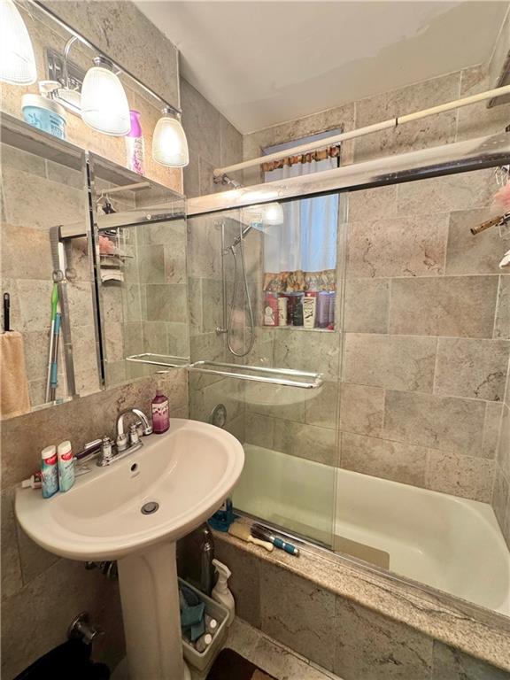 3105 Ave V, Unit 2E Brooklyn, NY 11229 - Photo 6 of 9 a bathroom with a sink and mirror