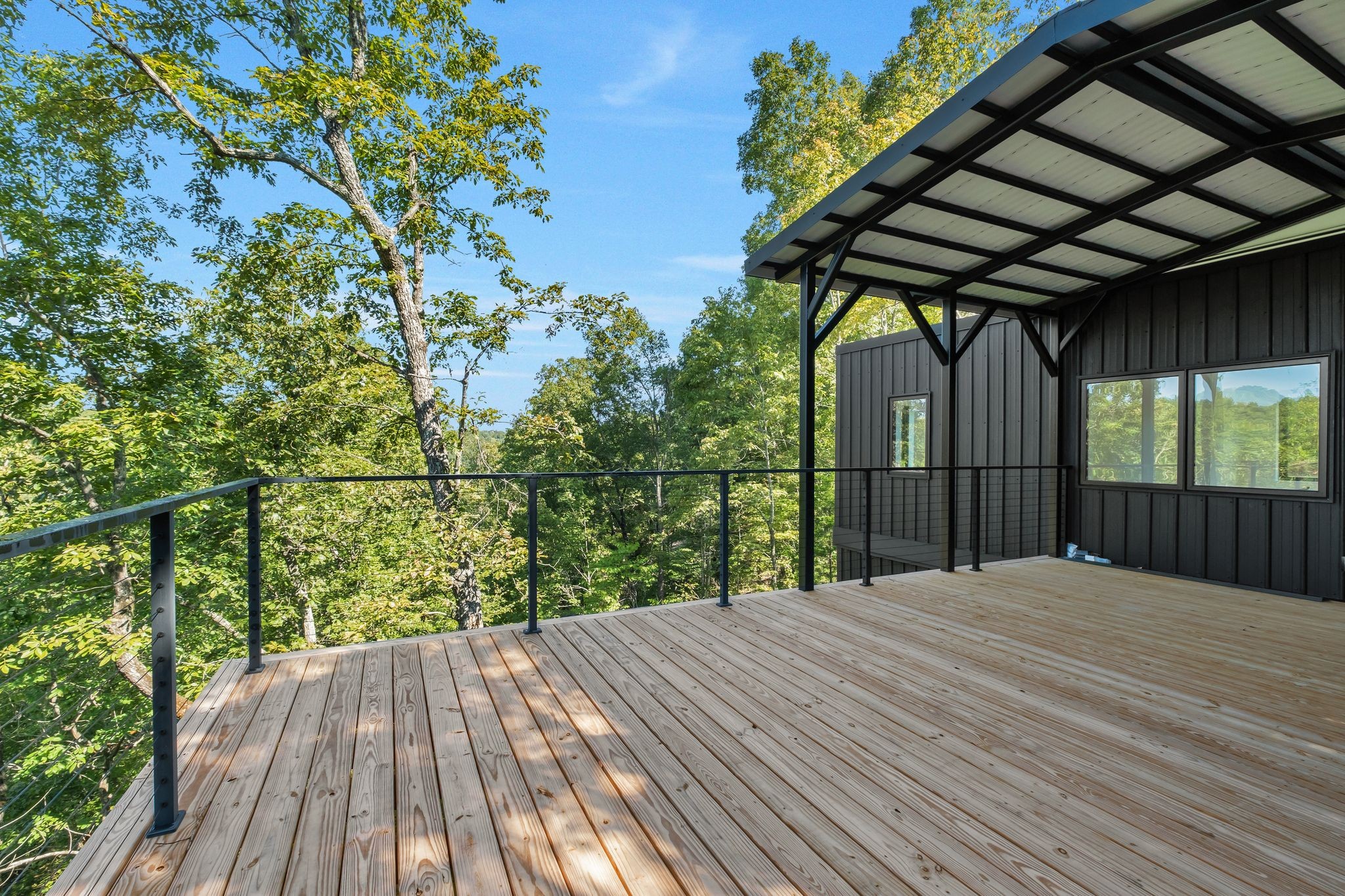 0 Wet Mill Creek Road Celina, TN 38551 - Photo 18 of 42 a view of backyard with wooden floor and fence